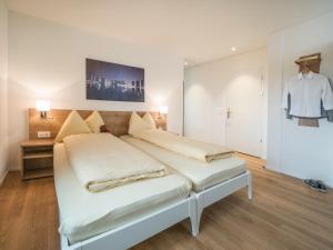 Postel nebo postele na pokoji v ubytování Aparthotel Bären