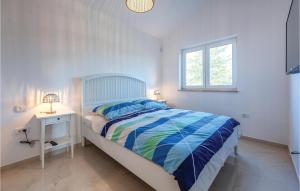 Postel nebo postele na pokoji v ubytování Cozy Home In Cambarelici