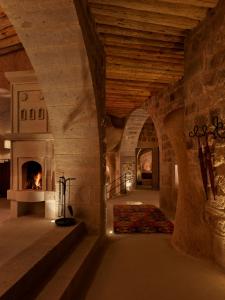 A bed or beds in a room at Argos in Cappadocia