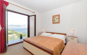 Postel nebo postele na pokoji v ubytování Apartment Racisce Bb Vi