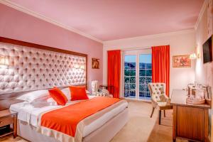 Postel nebo postele na pokoji v ubytování Simfonia Boutique Hotel