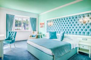 Postel nebo postele na pokoji v ubytování Simfonia Boutique Hotel