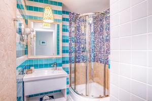 Koupelna v ubytování Simfonia Boutique Hotel