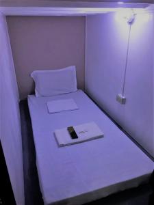 Letto o letti in una camera di RDC - Mariveles Transient Capsule