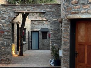 an entrance to a stone building with a wooden door at Melrose Mission Lodge in Prospect +11 photos