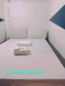 Letto o letti in una camera di RDC - Mariveles Transient Capsule