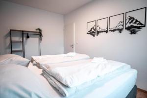 Postel nebo postele na pokoji v ubytování MGHolidays