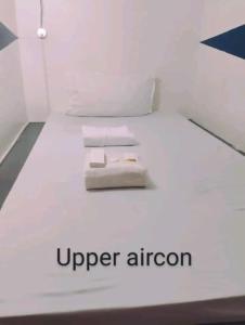 Letto o letti in una camera di RDC - Mariveles Transient Capsule