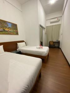 Ong Hotel客房内的一张或多张床位