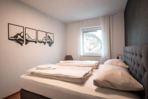 Postel nebo postele na pokoji v ubytování MGHolidays