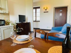 TV a/nebo společenská místnost v ubytování Residence Maria Giulia