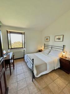 Postel nebo postele na pokoji v ubytování Residence Maria Giulia