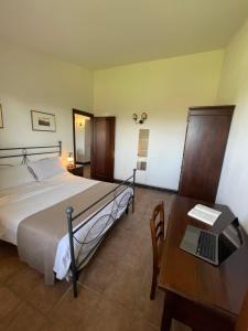 Postel nebo postele na pokoji v ubytování Residence Maria Giulia