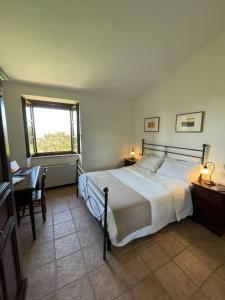 Postel nebo postele na pokoji v ubytování Residence Maria Giulia