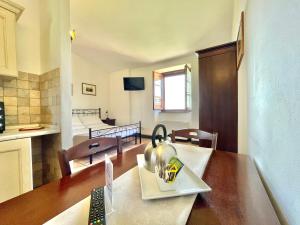 TV a/nebo společenská místnost v ubytování Residence Maria Giulia