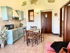 Kuchyň nebo kuchyňský kout v ubytování Residence Maria Giulia