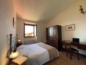 Postel nebo postele na pokoji v ubytování Residence Maria Giulia + 37 fotografií