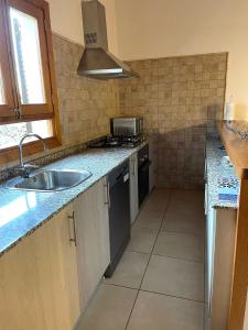A kitchen or kitchenette at Can Miquel