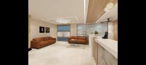 a living room with two couches and a table at Agarwal's Residency in Visakhapatnam