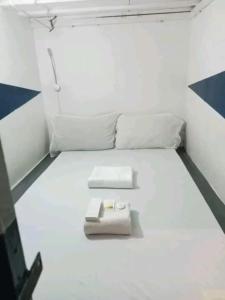 Letto o letti in una camera di RDC - Mariveles Transient Capsule