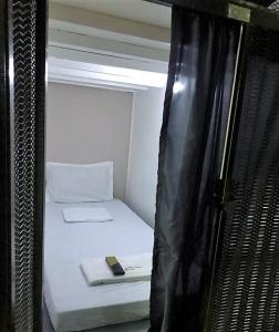 Letto o letti in una camera di RDC - Mariveles Transient Capsule