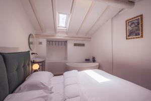 Voodi või voodid majutusasutuse Suite Design & Spa toas