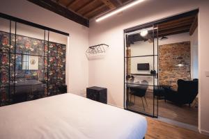 Voodi või voodid majutusasutuse Suite Design & Spa toas