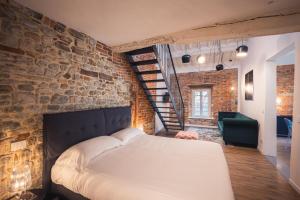 Voodi või voodid majutusasutuse Suite Design & Spa toas