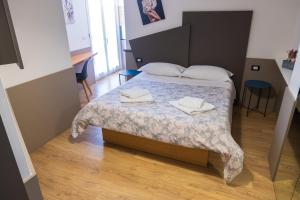 Postel nebo postele na pokoji v ubytování Avezzano 3e60