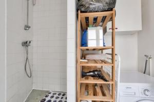 Koupelna v ubytování Appart confort moderne près Montmartre + 7 fotografií