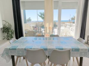 Kép Appartamento La Torre piano terra sul mare Puglia On line szállásáról Torre Mozzában a galériában