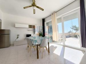 Kép Appartamento La Torre piano terra sul mare Puglia On line szállásáról Torre Mozzában a galériában