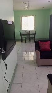 TV a/nebo společenská místnost v ubytování Lopez Jaena Guest House