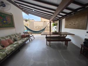 Posezení v ubytování Suite com piscina