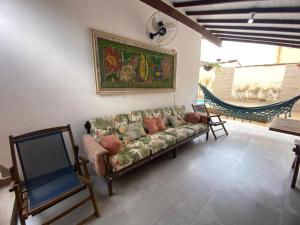 Posezení v ubytování Suite com piscina