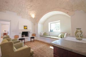 Posezení v ubytování TD Trulli Lorusso Design Luxury Trulli with Pool