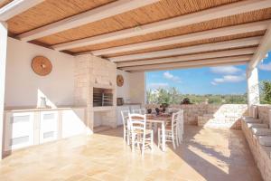 Fotografie z fotogalerie ubytování TD Trulli Lorusso Design Luxury Trulli with Pool v destinaci Castellana Grotte