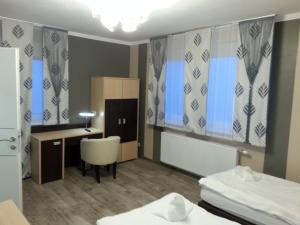 Krevet ili kreveti u jedinici u okviru objekta Pension Central Semmering