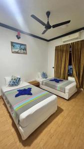 Letto o letti in una camera di Coco Cottage Local Style