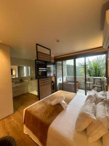 Cama ou camas em um quarto em Duke Beach Hotel Maresias