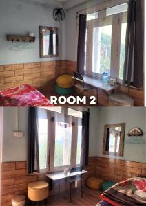ToshにあるFullmoon homestayの窓付きの部屋、テーブル付きの部屋