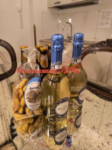 two bottles of wine sitting on top of a counter at Ca' Dell' Arte Luxury in Venice