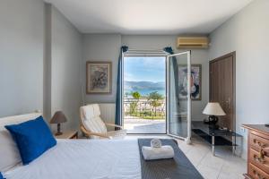 Posteľ alebo postele v izbe v ubytovaní Xenia Ionis luxury apartments