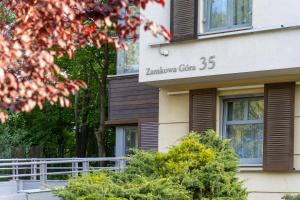 a building with a sign that reads london city at Hotel Aqua Sopot - Destigo Hotels in Sopot