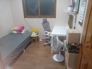 Rúm í herbergi á Ocean House - Pyeongtaek 2