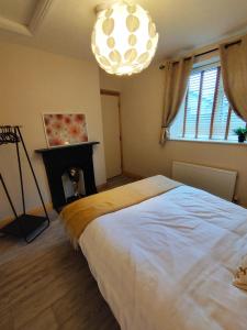 Krevet ili kreveti u jedinici u okviru objekta The Apartment