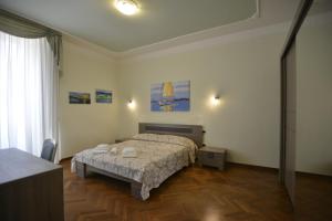 A bed or beds in a room at Casa Alice
