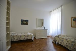 A bed or beds in a room at Casa Alice