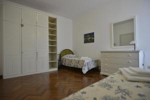 A bed or beds in a room at Casa Alice