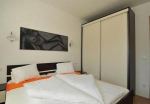 Postel nebo postele na pokoji v ubytování Apartments Martin